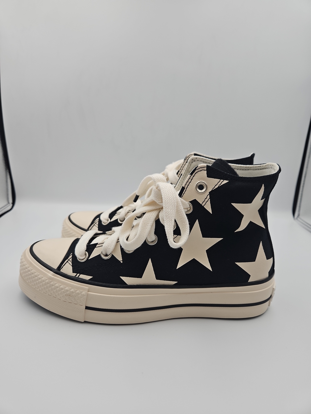 Converse Black High-Top Sneakers with Cream Star Print